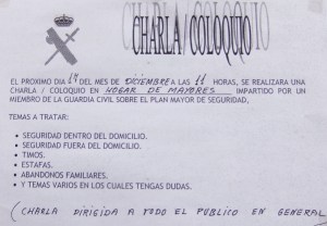 Cartel anunciando la charla-coloquio